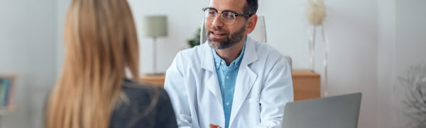 Male Doctor Explaining Something to a Patient