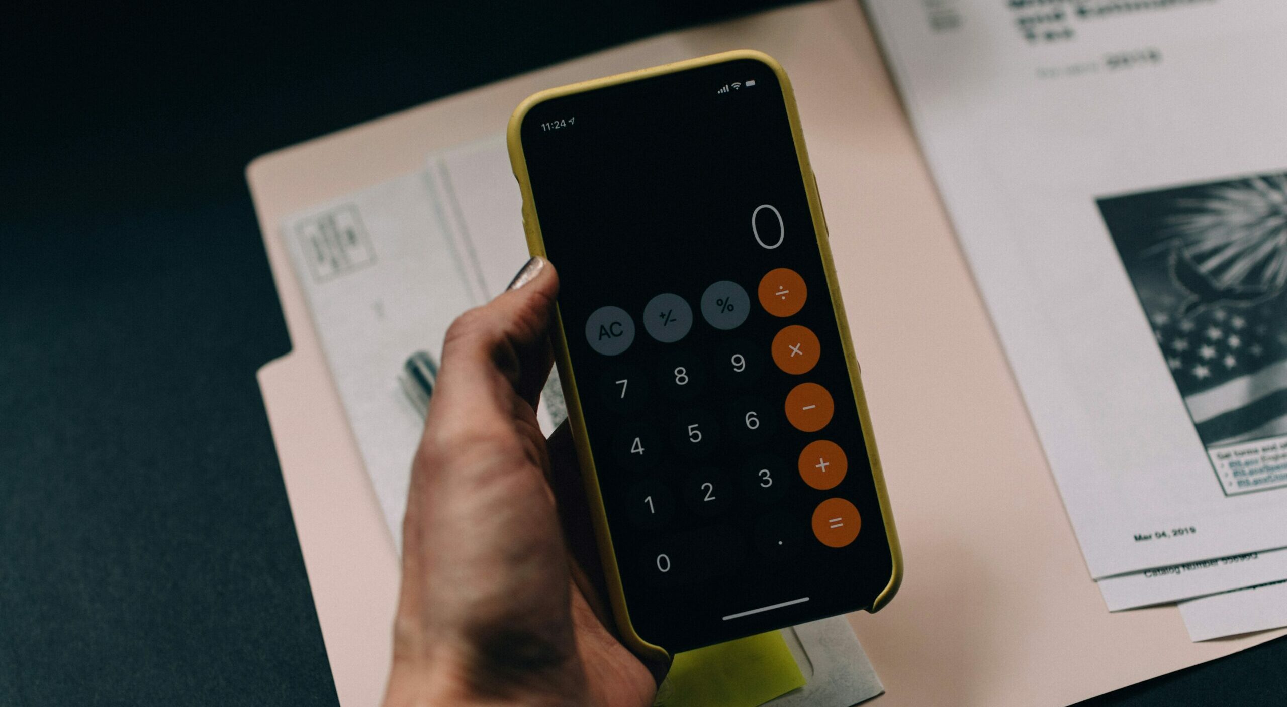 Women Holding a Calculator