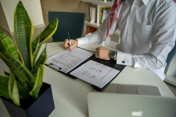 Doctor Signing Paperwork