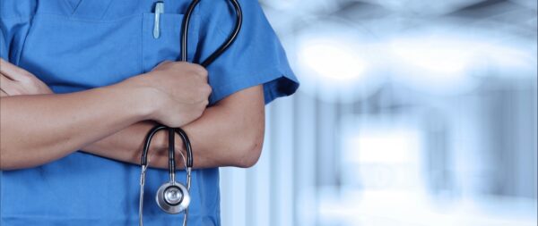 A Doctor Holding a Stethoscope