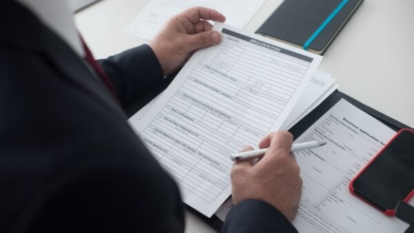 A provider reviewing a credentialing and enrollment application form