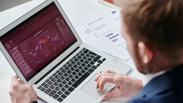 A person reviewing a medical practice analytics dashboard of KPIs