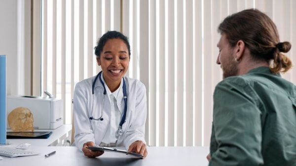 Physician consulting with a patient in a private practice