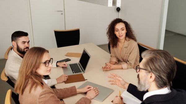 Professional team discussing business strategy in a modern office
