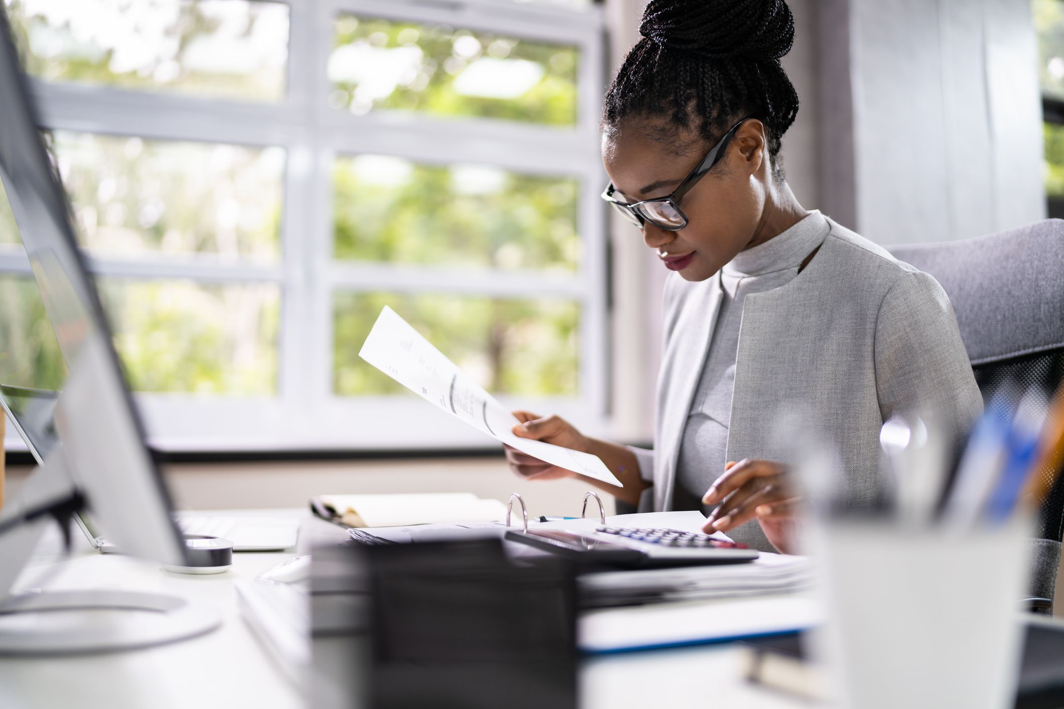 A Doctor Looking at Paperwork