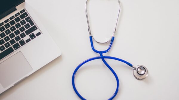 Laptop and stethoscope representing digital marketing for a medical practice