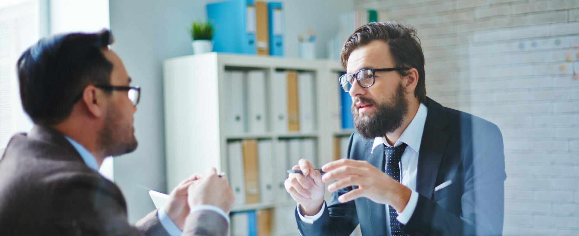 two men consulting